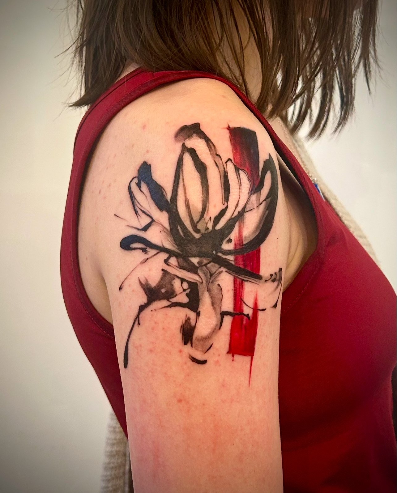 Sumi-e inspired hand drawn flower tattoo done by Sway Tattoo at Ashton Ink Tattoo Studio