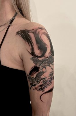 Brush sumi dragon tattoo done by Sway Tattoo at Ashton Ink Tattoo Studio, added to existing crane piece by another artist - tattoo studio manchester