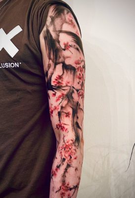 Freehand sumi plum blossom tattoo done by Sway Tattoo at Ashton Ink Tattoo Studio - tattoo studio manchester