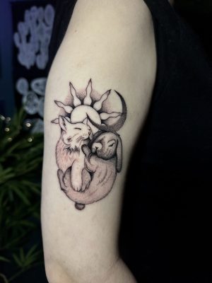 Tribute tattoo done by Symone from Ashton Ink Tattoo Studio, featuring two amazing furry souls - the idea was to create a balance of Yin and Yang between them and to show off their opposing Sun and Moon energies